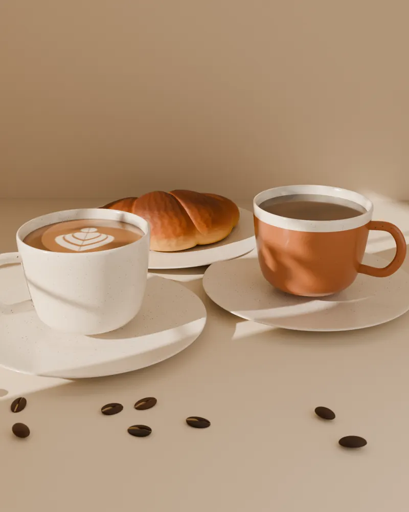 Two coffee cups on the long table in morning light.